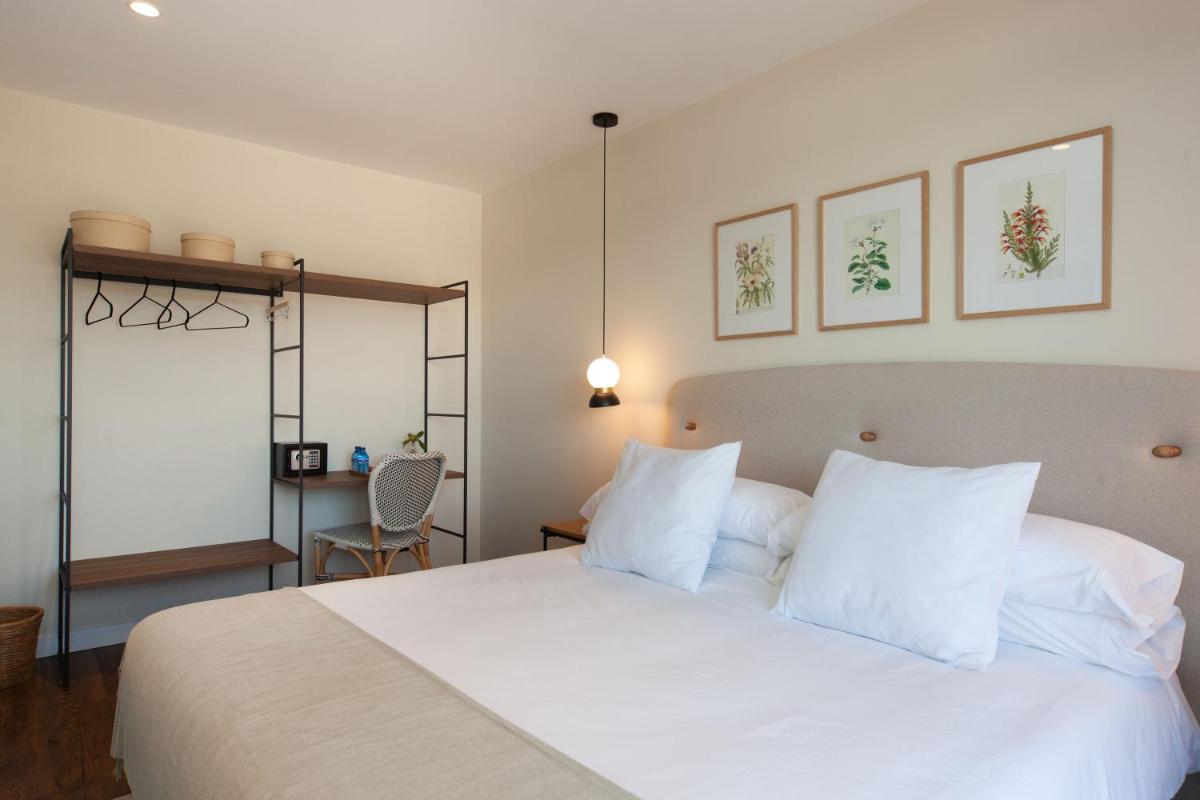 Cama o camas de una habitación en Duruelo Mountain Suites