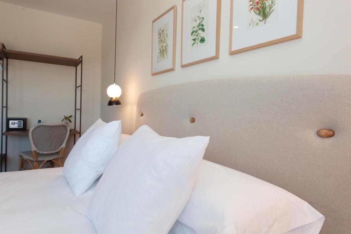 Cama o camas de una habitación en Duruelo Mountain Suites