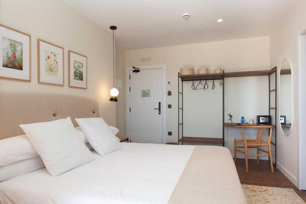 Cama o camas de una habitación en Duruelo Mountain Suites