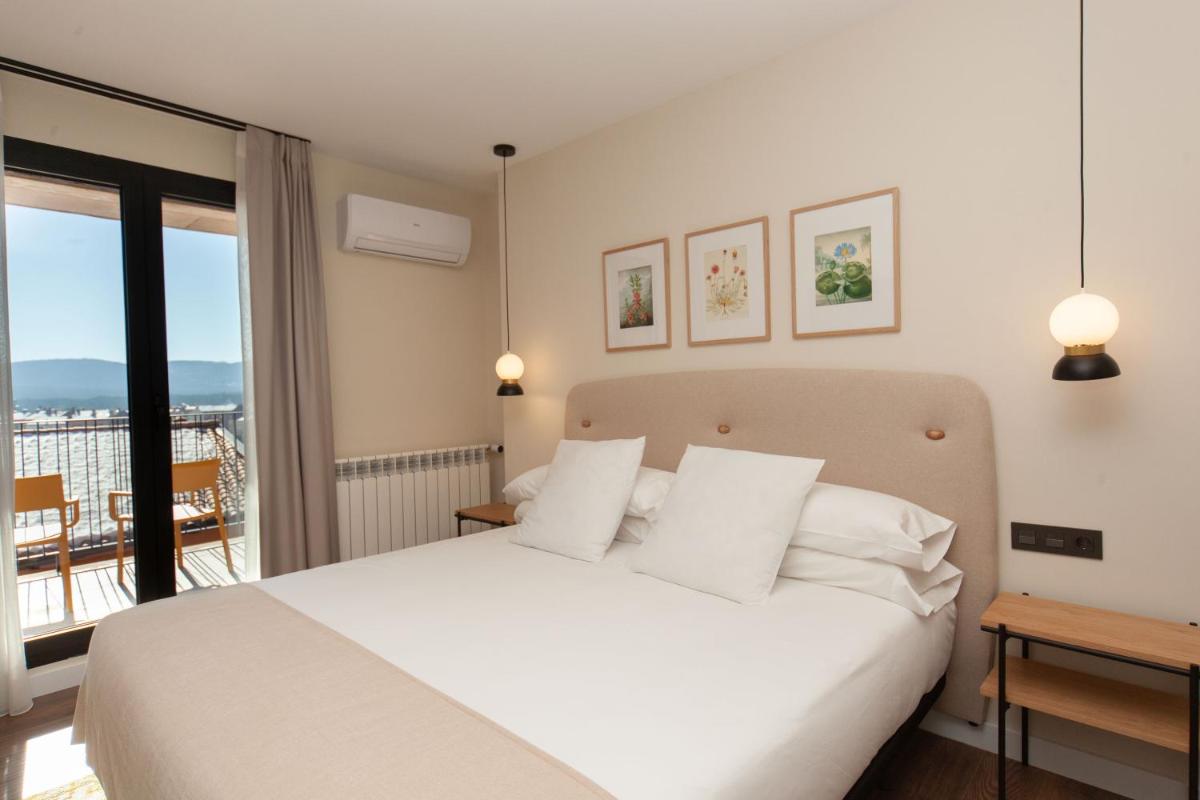 Cama o camas de una habitación en Duruelo Mountain Suites