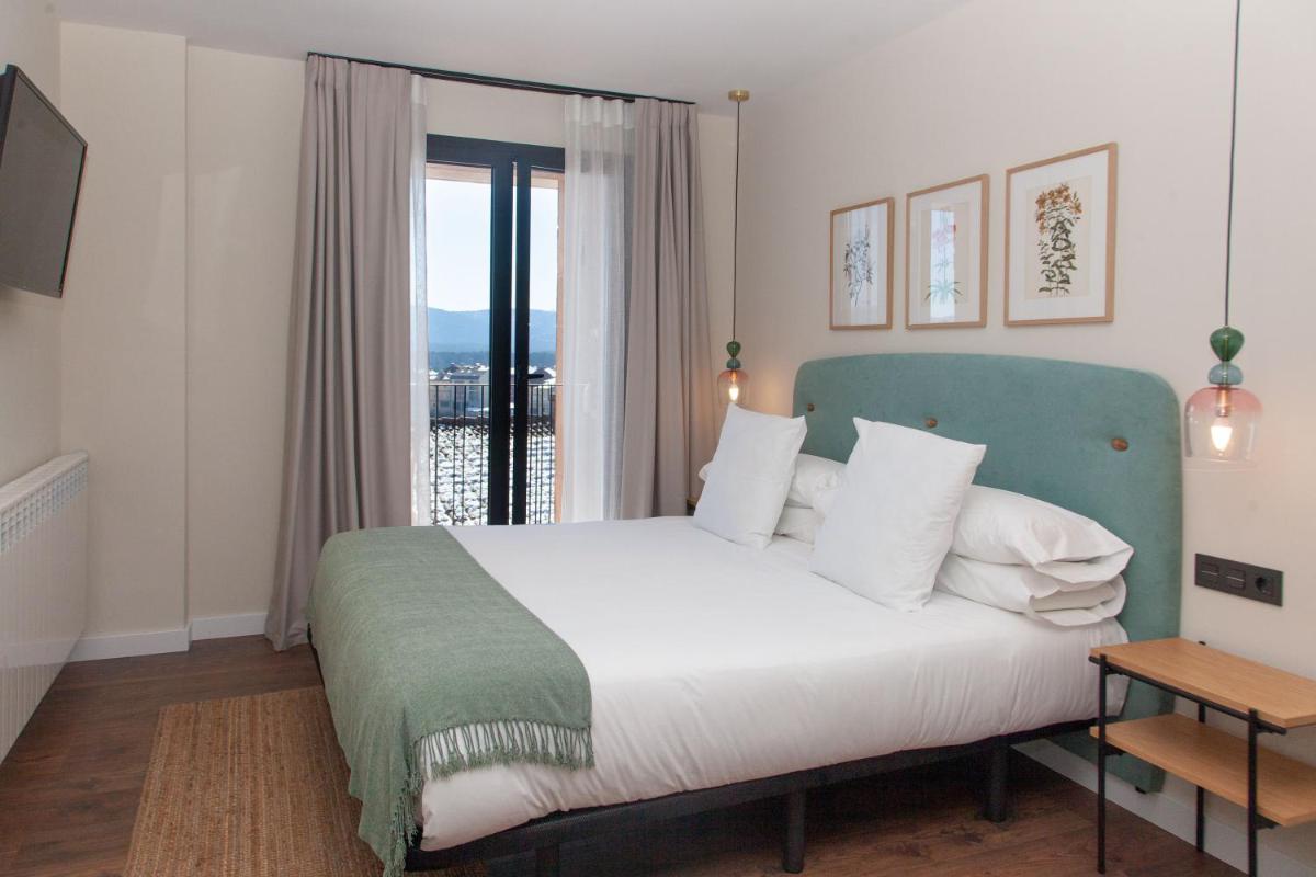 Cama o camas de una habitación en Duruelo Mountain Suites