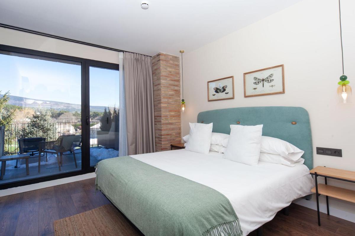 Cama o camas de una habitación en Duruelo Mountain Suites