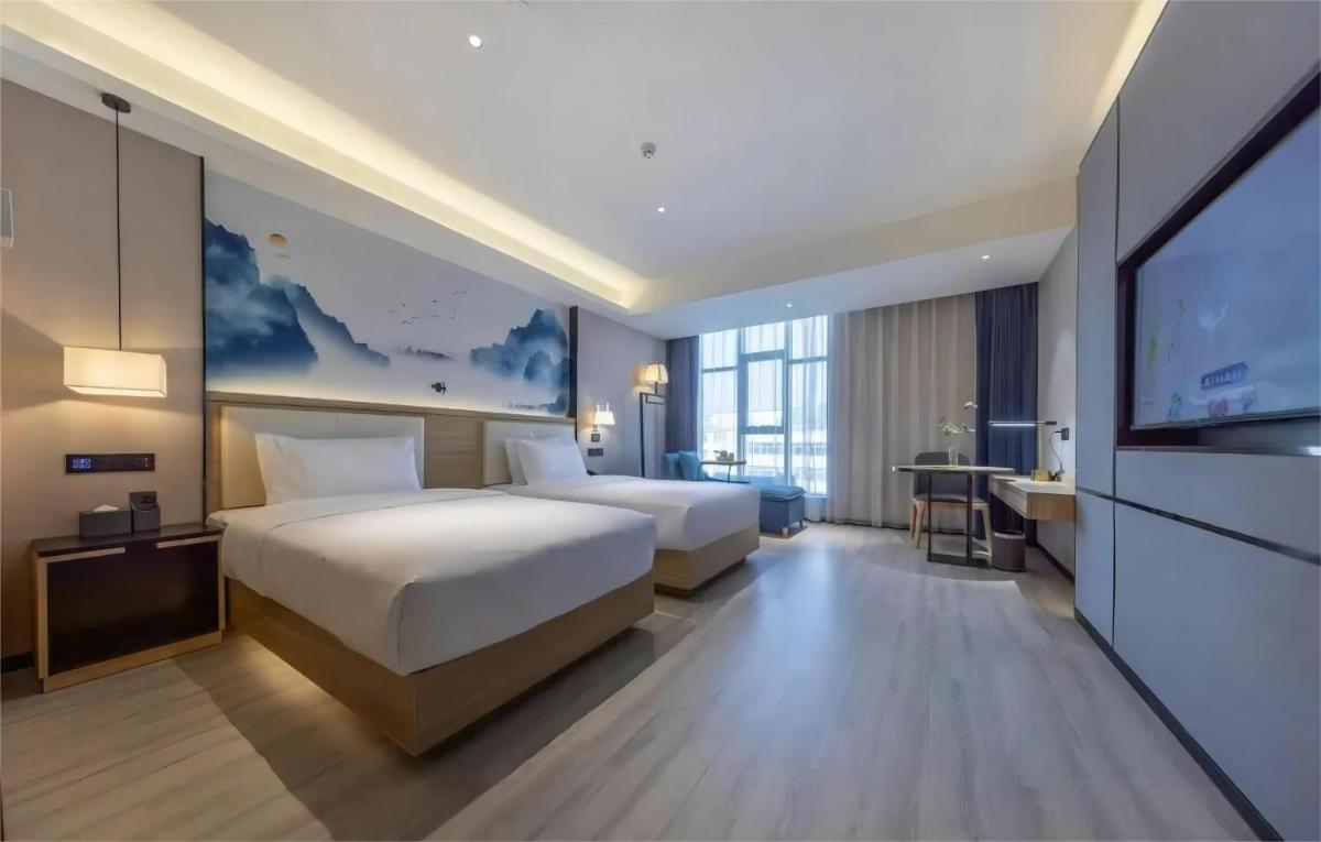Ausotel by Argyle Baiyun International Airport Renhe Metro Exit B - Housity