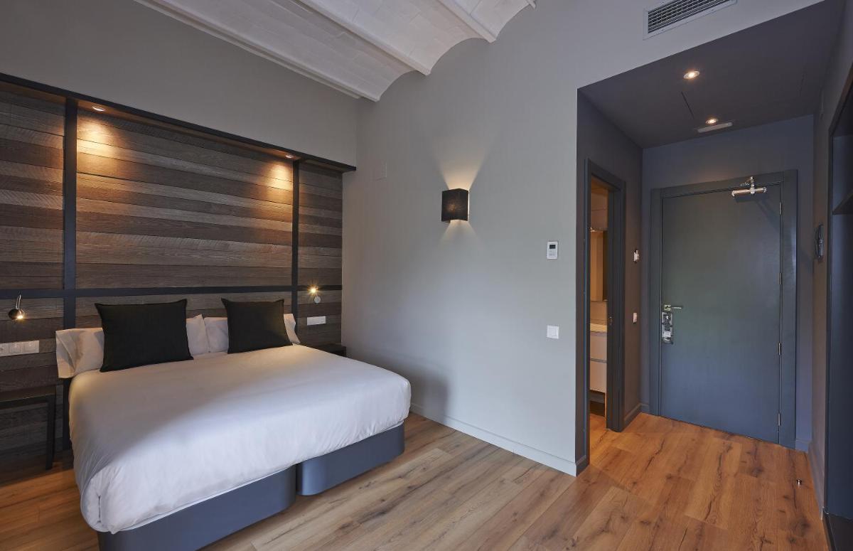 Cama o camas de una habitación en Hotel Parada Puigcerda