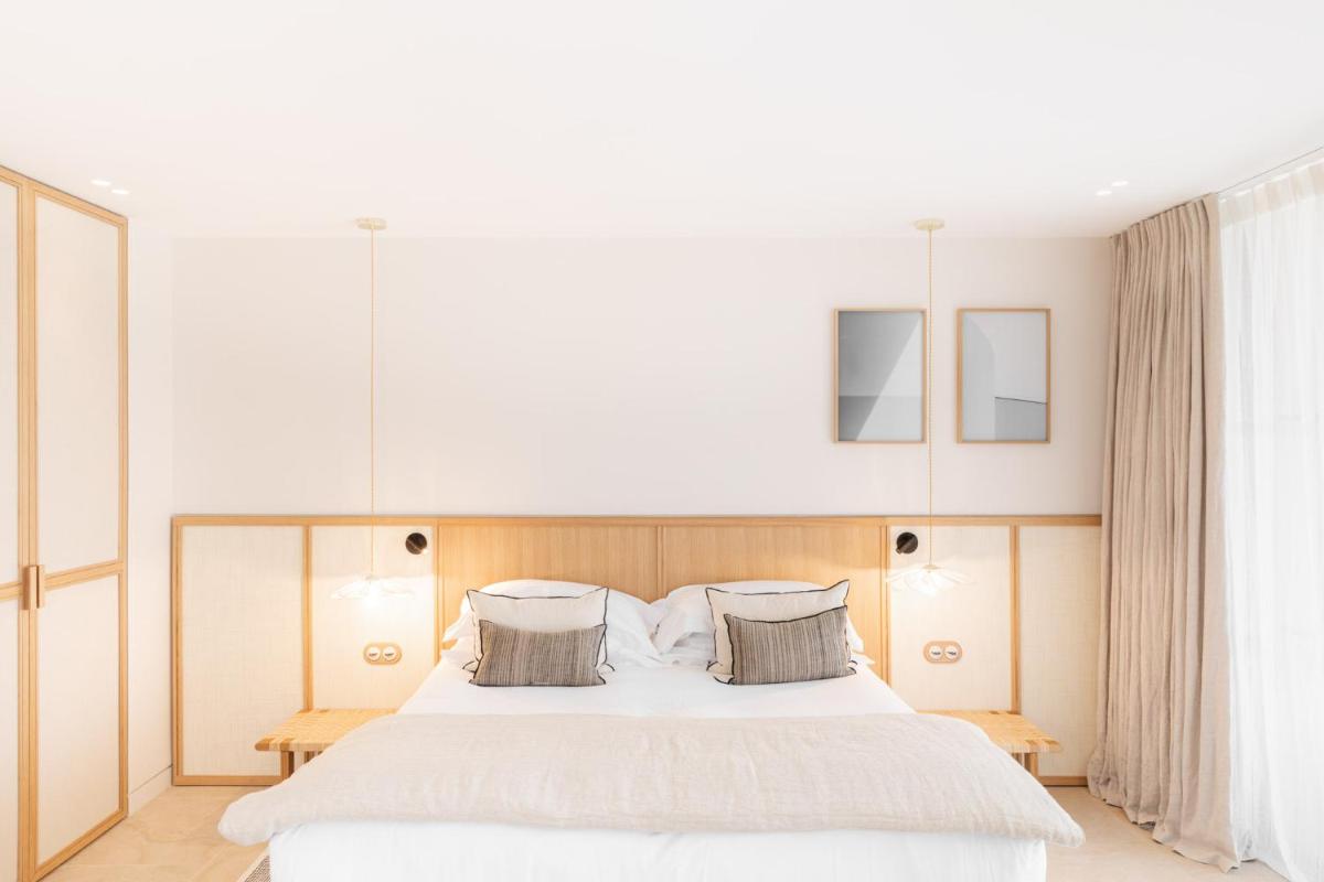 Un ou plusieurs lits dans un hébergement de l'établissement Le Couvent des Minimes, un Hôtel & Spa L'Occitane en Provence