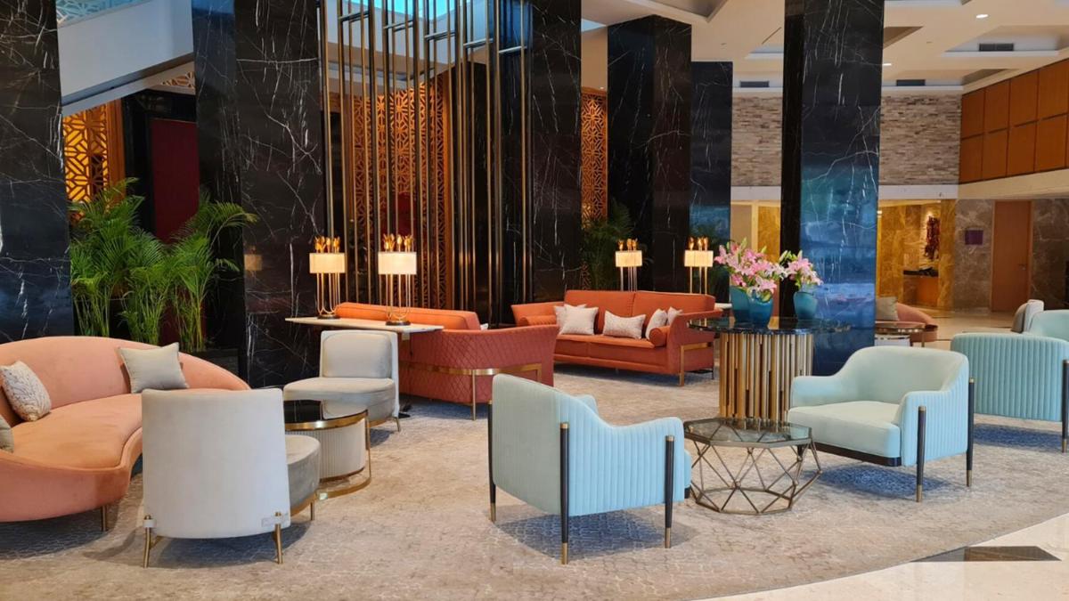 a lobby with couches and chairs at InterContinental Jaipur Tonk Road by IHG in Jaipur