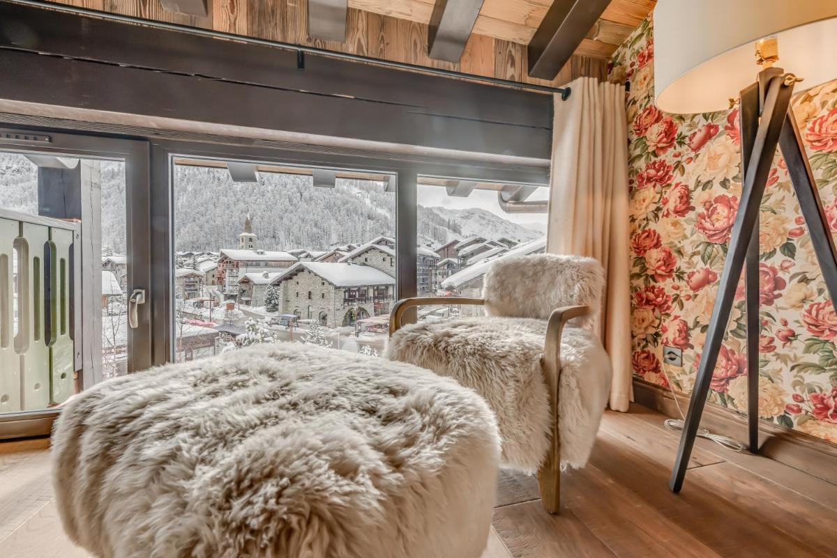 Un ou plusieurs lits dans un hébergement de l'établissement Hotel & Spa Le Val d'Isère