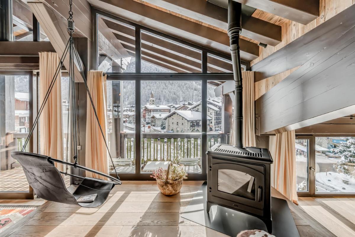 Télévision ou salle de divertissement dans l'établissement Hotel & Spa Le Val d'Isère