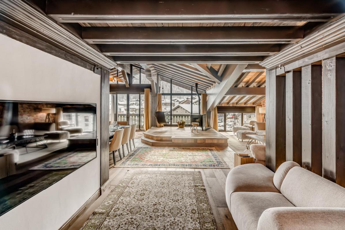 Coin salon dans l'établissement Hotel & Spa Le Val d'Isère