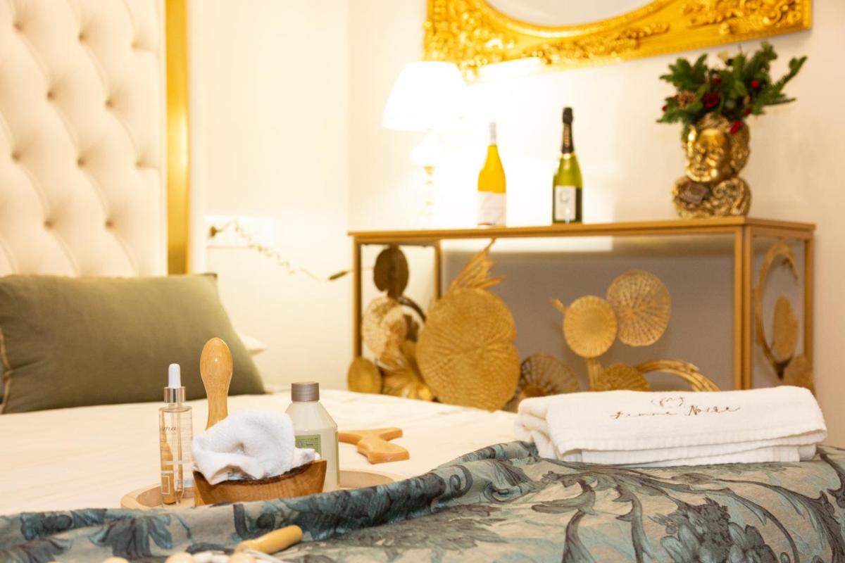 Femme noir Boutique Apartament Fitness e spa - Housity