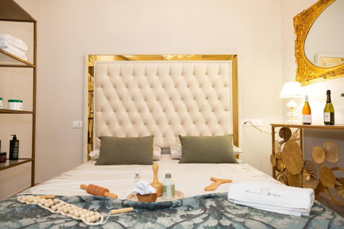 Femme noir Boutique Apartament Fitness e spa - Housity