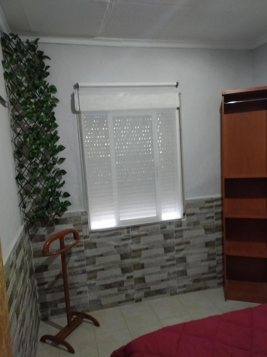 Habitación natural rústica en casa compartida - Housity