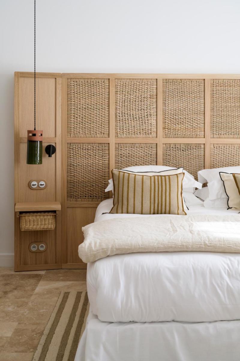 Un ou plusieurs lits dans un hébergement de l'établissement Le Couvent des Minimes, un Hôtel & Spa L'Occitane en Provence