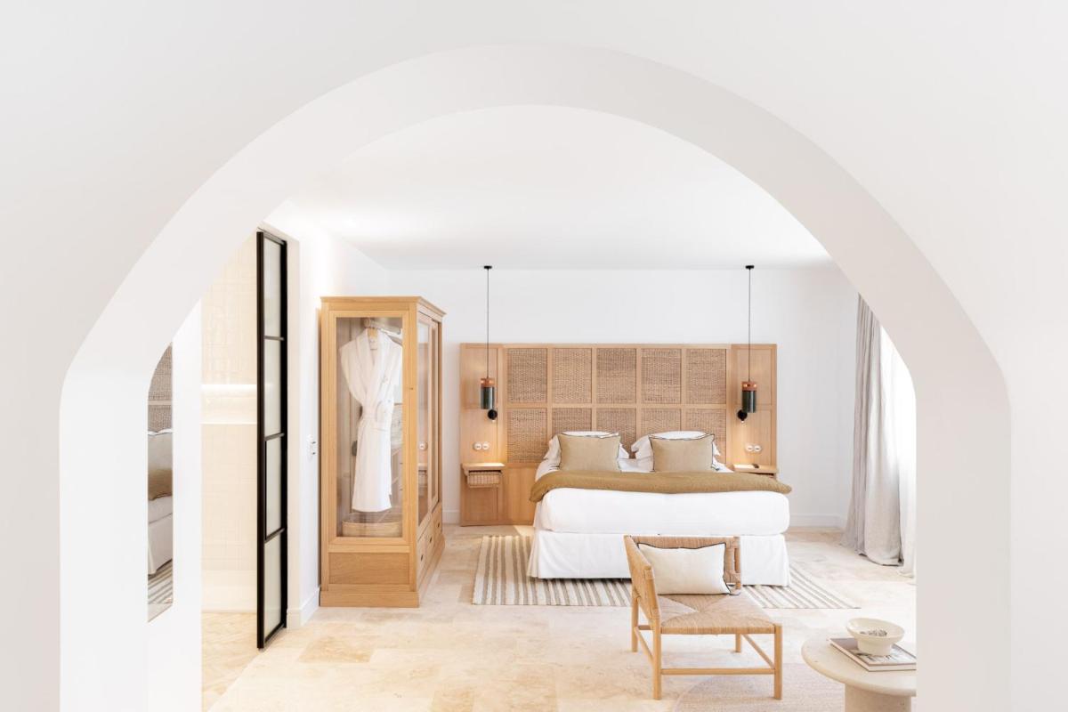 Un ou plusieurs lits dans un hébergement de l'établissement Le Couvent des Minimes, un Hôtel & Spa L'Occitane en Provence