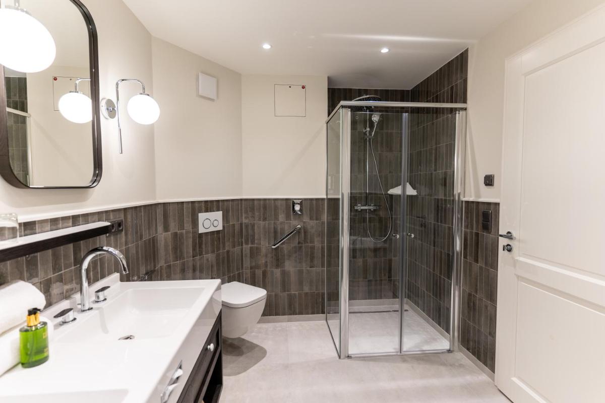 Ein Badezimmer in der Unterkunft Hotel Strandperle