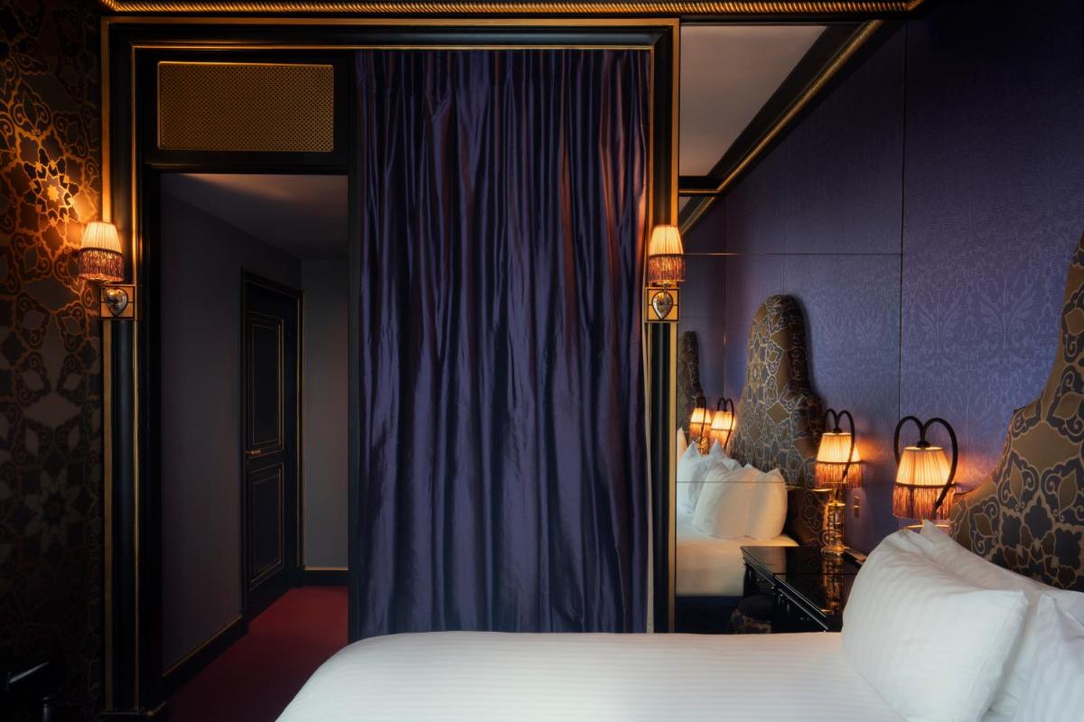 Un ou plusieurs lits dans un hébergement de l'établissement Maison Souquet, Hotel & Spa
