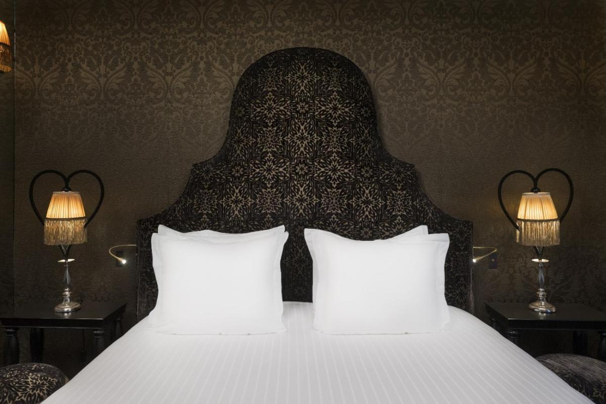 Un ou plusieurs lits dans un hébergement de l'établissement Maison Souquet, Hotel & Spa