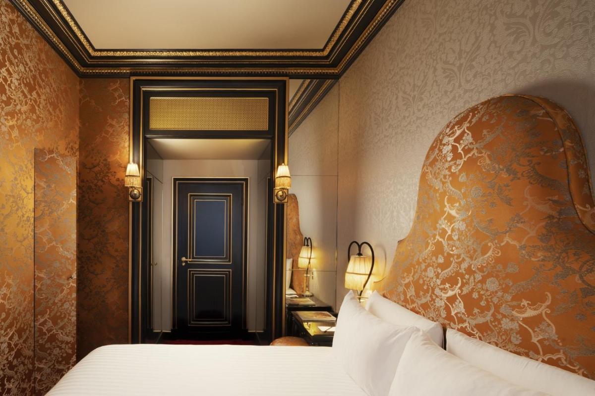 Un ou plusieurs lits dans un hébergement de l'établissement Maison Souquet, Hotel & Spa