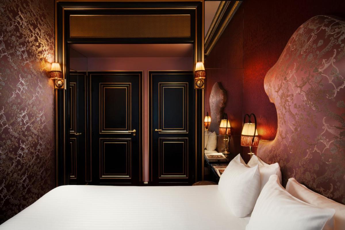 Un ou plusieurs lits dans un hébergement de l'établissement Maison Souquet, Hotel & Spa