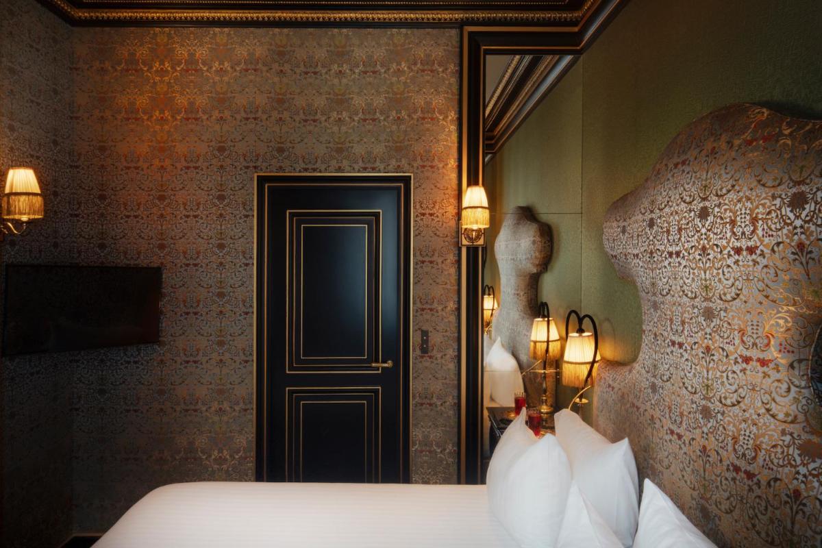Un ou plusieurs lits dans un hébergement de l'établissement Maison Souquet, Hotel & Spa