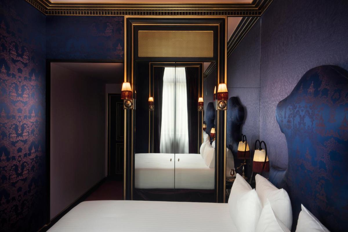 Un ou plusieurs lits dans un hébergement de l'établissement Maison Souquet, Hotel & Spa