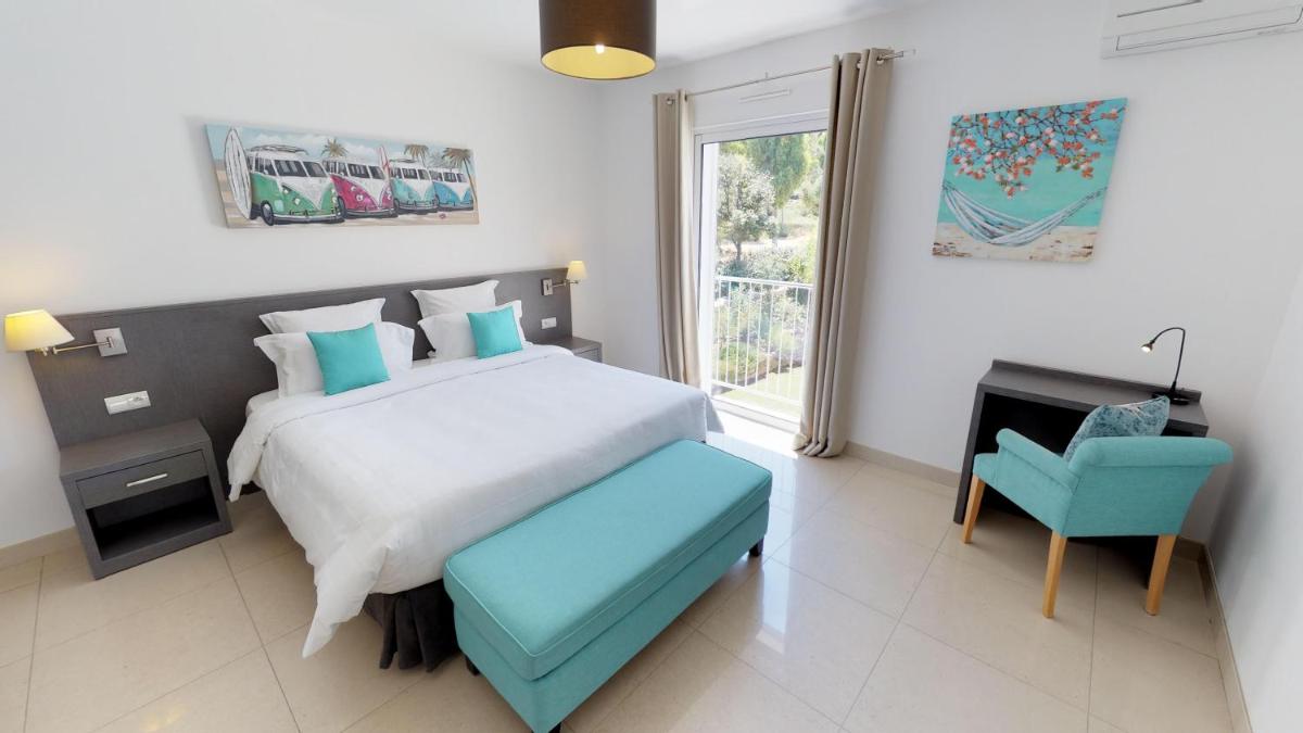 Un ou plusieurs lits dans un hébergement de l'établissement Domaine Villas Mandarine Private Pools & Spa