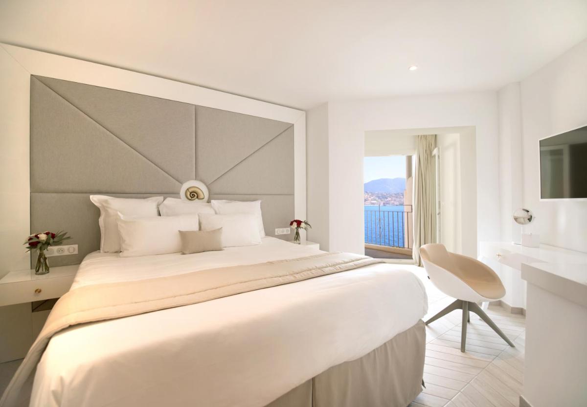 Un ou plusieurs lits dans un hébergement de l'établissement Hôtel Marinca & Spa