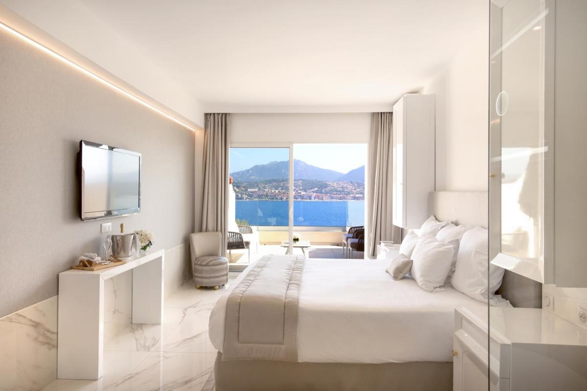 Un ou plusieurs lits dans un hébergement de l'établissement Hôtel Marinca & Spa