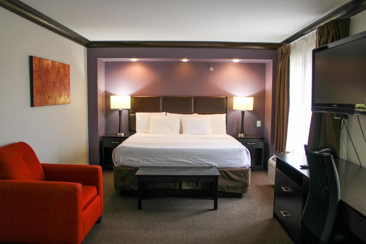 Parkwood Inn & Suites - Housity