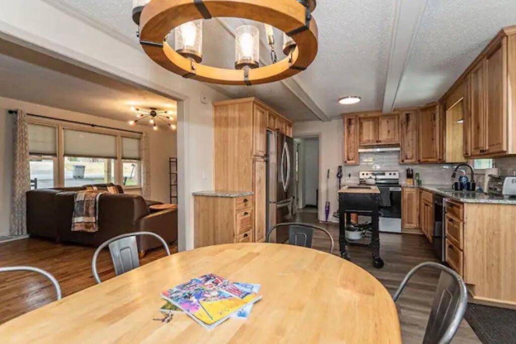 Pet Friendly House with Bike Trail Access and Huge Fenced Yard - Housity