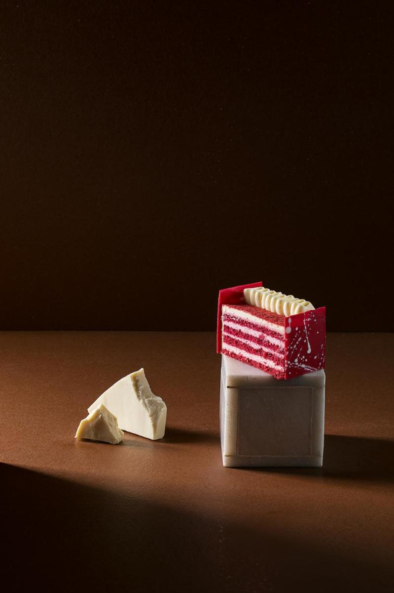 a red and white box and a piece of butter at JW Marriott Mumbai Juhu in Mumbai