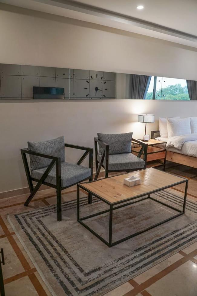 Roomy Signature Hotel, Islamabad - Housity