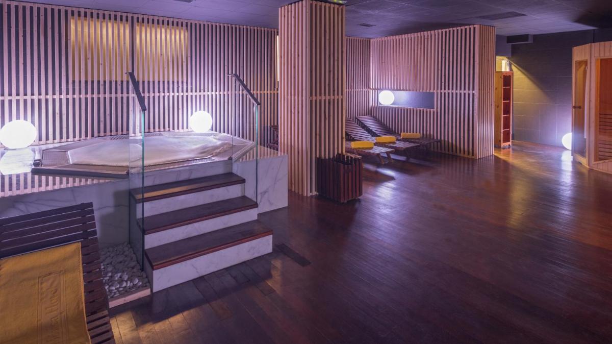 Cama o camas de una habitación en Mònica Hotel