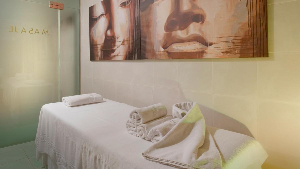 Cama o camas de una habitación en Mònica Hotel
