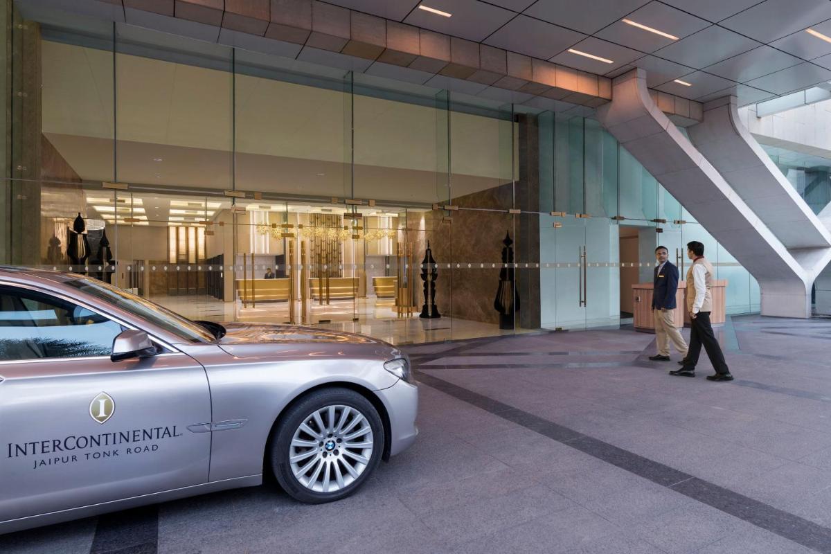 a silver car parked in front of a building at InterContinental Jaipur Tonk Road by IHG in Jaipur
