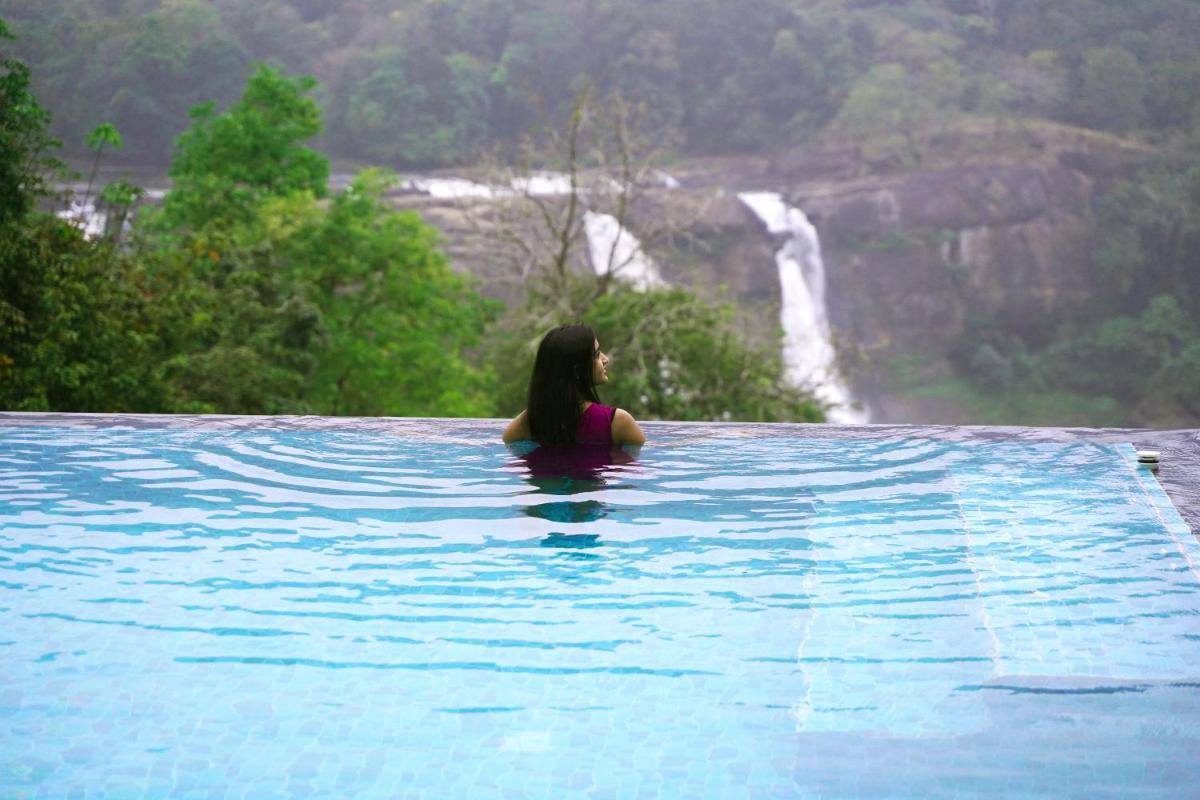 Flora Misty Falls Athirappilly - Housity