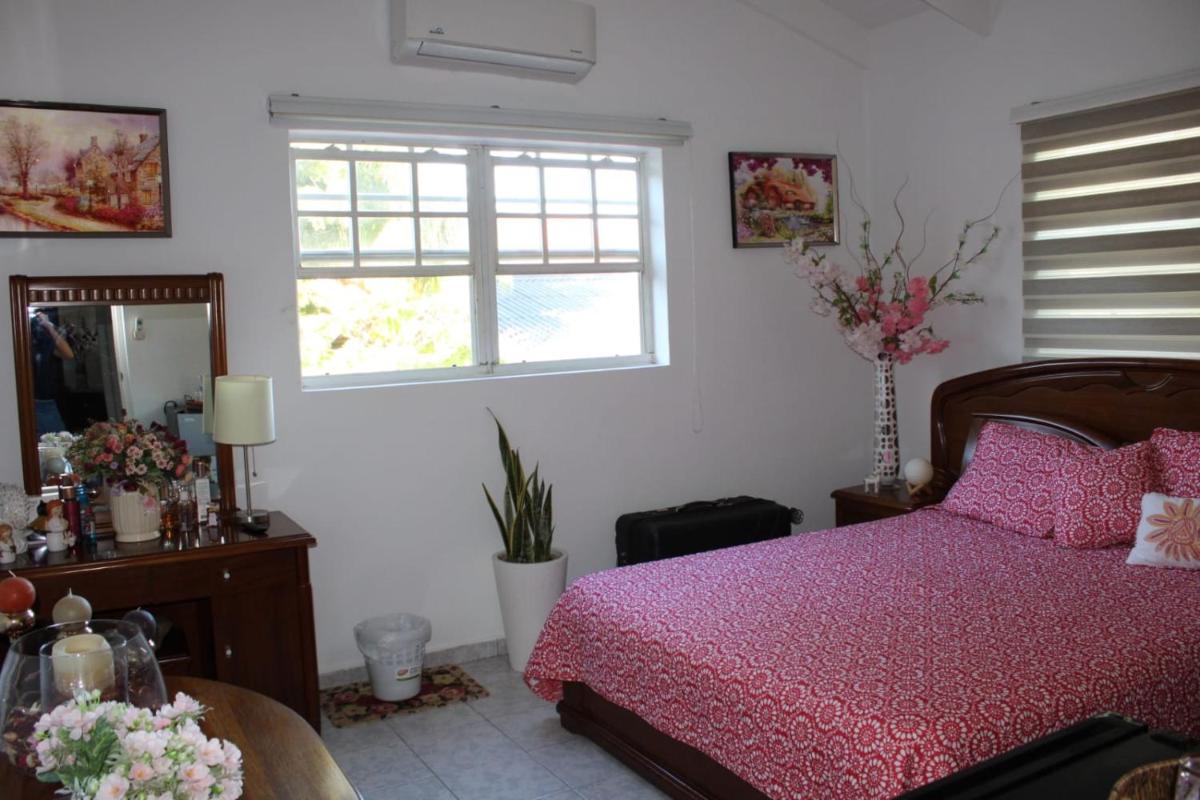 Villa Esther two private rooms in a Vacation Villa near Blue Bay golf and beach resort - Housity