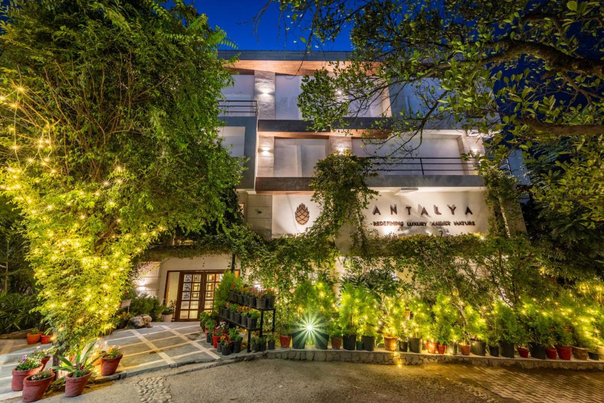 a building with lights in front of it at Antalya By Divine Ganga Cottage in Rishīkesh
