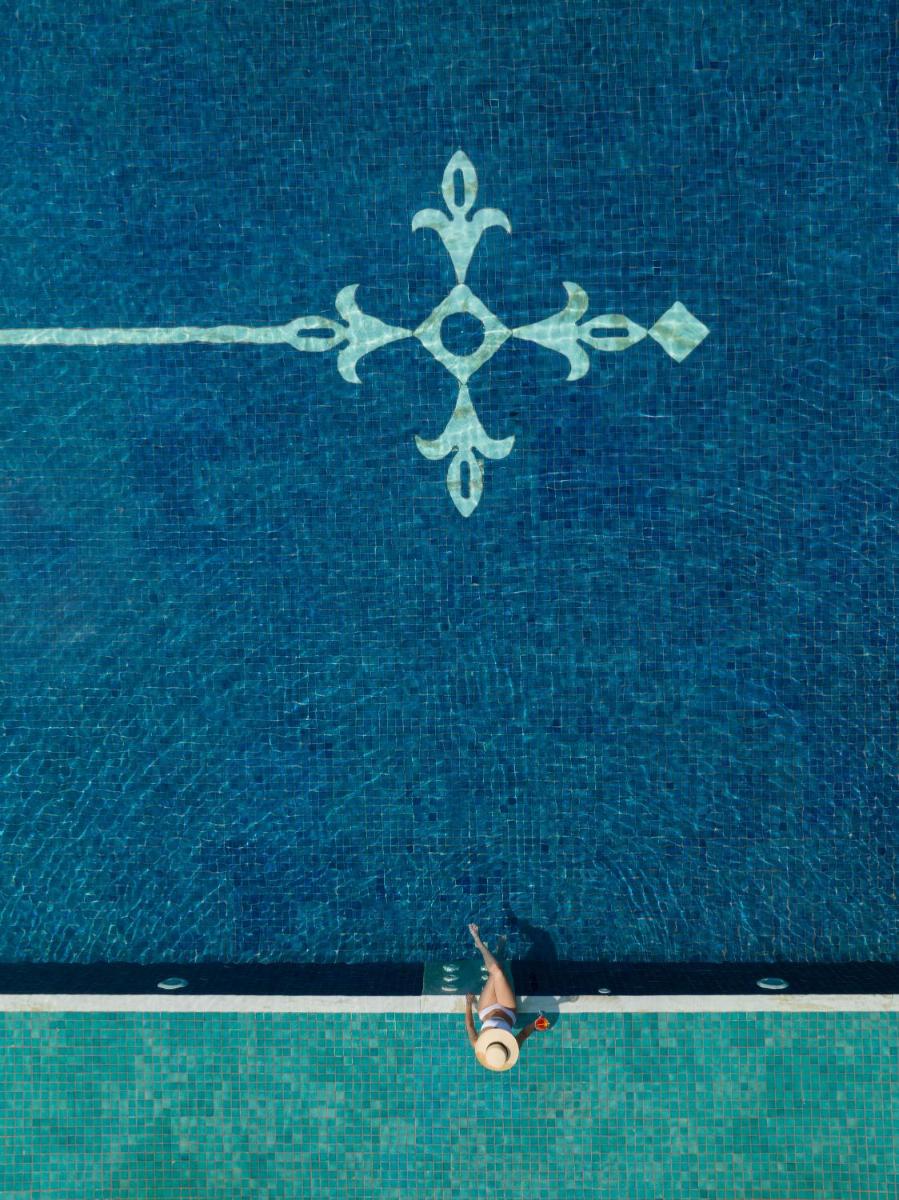 a person on a skateboard in a swimming pool at Taj Krishna in Hyderabad