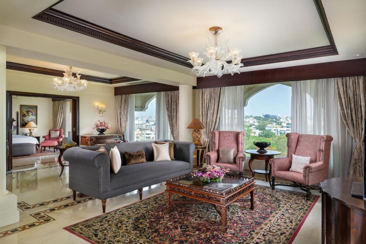 a living room with a couch and a table at Taj Krishna in Hyderabad