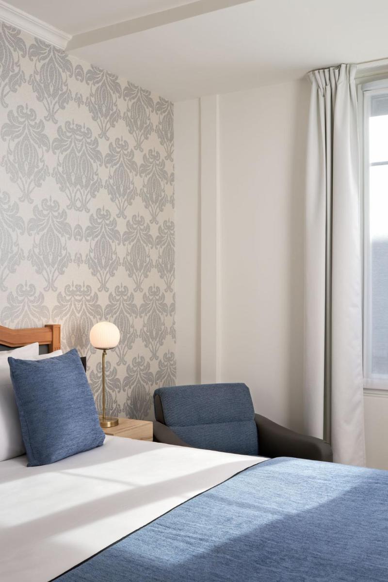 Un ou plusieurs lits dans un hébergement de l'établissement Hotel Villa Romantic & Spa