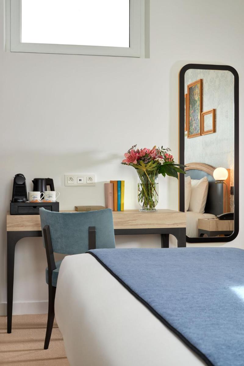 Un ou plusieurs lits dans un hébergement de l'établissement Hotel Villa Romantic & Spa