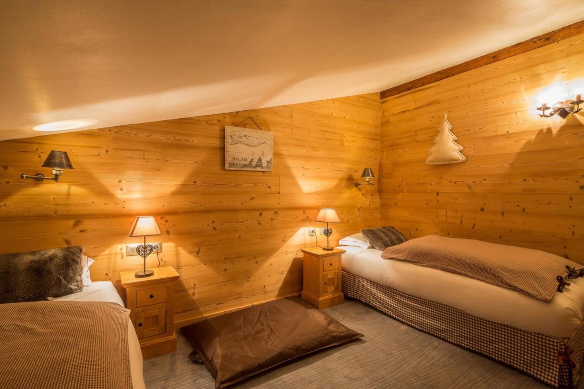 Un ou plusieurs lits dans un hébergement de l'établissement Les Grands Montets Hotel & Spa