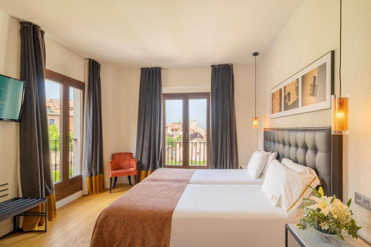 Cama o camas de una habitación en Áurea Convento Capuchinos by Eurostars Hotel Company