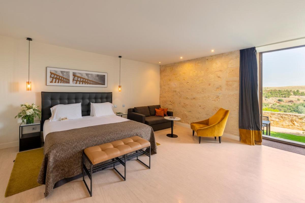 Cama o camas de una habitación en Áurea Convento Capuchinos by Eurostars Hotel Company