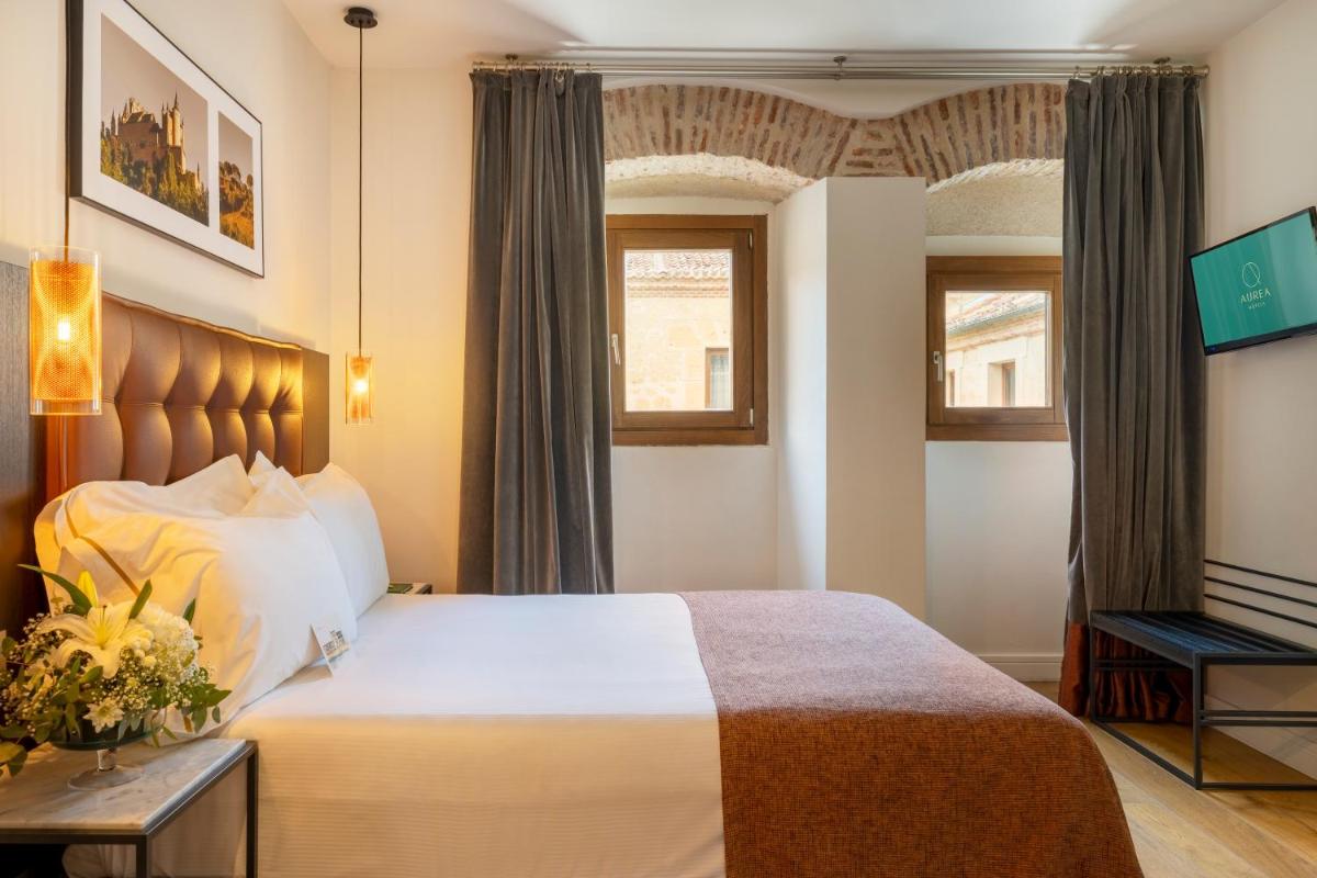 Cama o camas de una habitación en Áurea Convento Capuchinos by Eurostars Hotel Company