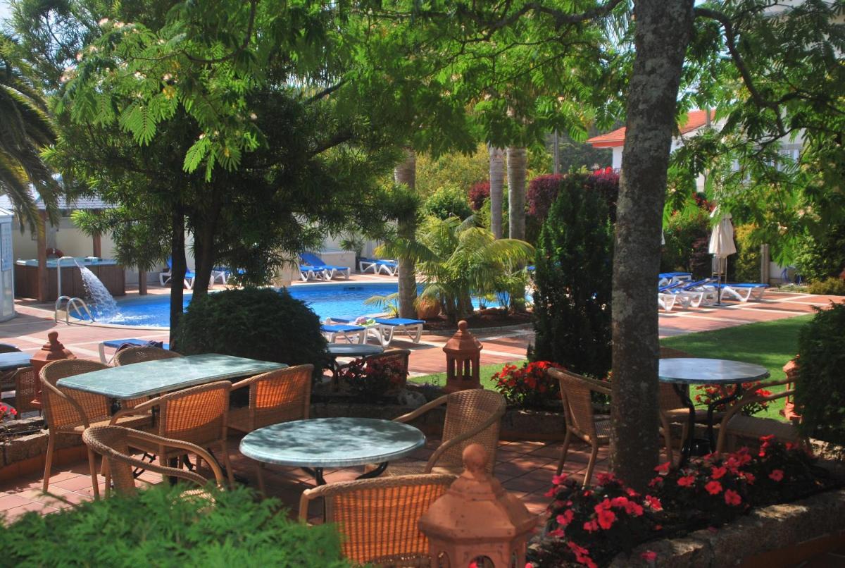 Piscina en o cerca de Hotel Spa Bosque mar