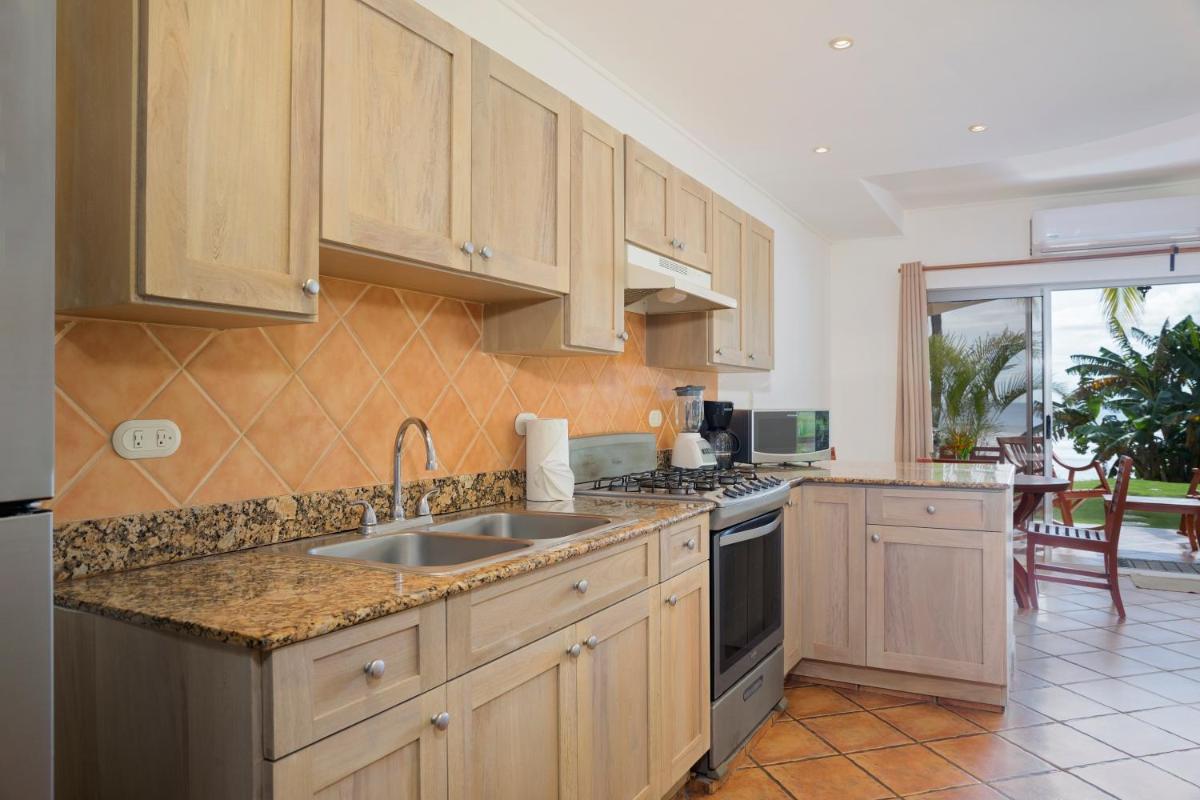 Villas Iguana A-13 Beachfront Condo - Housity