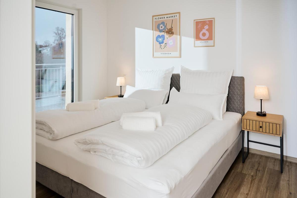 Rent4Living Apartments WLAN I kostenfreie Tiefgarage I Therme 5 Minuten zu Fuß I Barrierearm - Housity