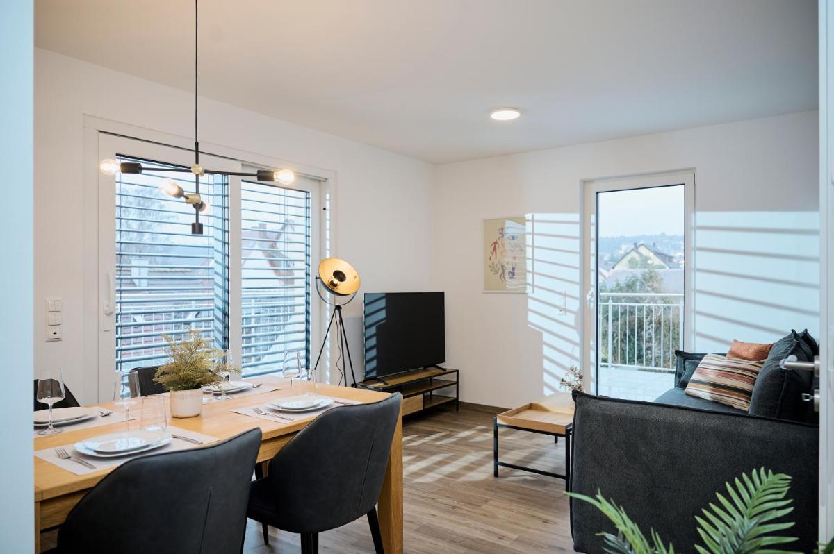 Rent4Living Apartments WLAN I kostenfreie Tiefgarage I Therme 5 Minuten zu Fuß I Barrierearm - Housity